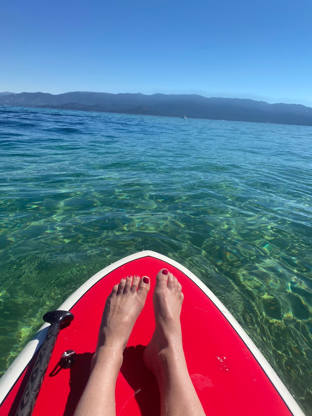 red paddle board on Lake Tahoe